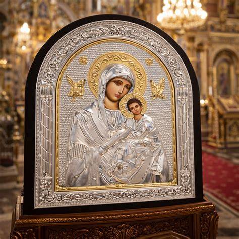 Imagine reprezentativă a Maicii Domnului cu Pruncul pe scutec în interpretarea tradițională ortodoxă
