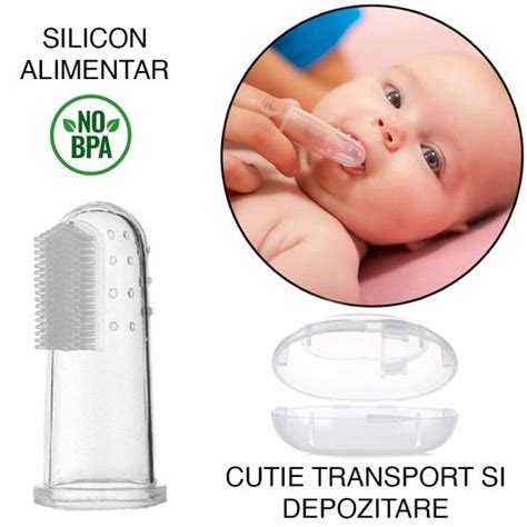 Bebeluș cu periuță de dinți degetar