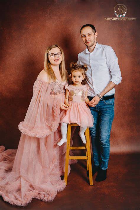 Fotografie de familie în așteptarea bebelușului