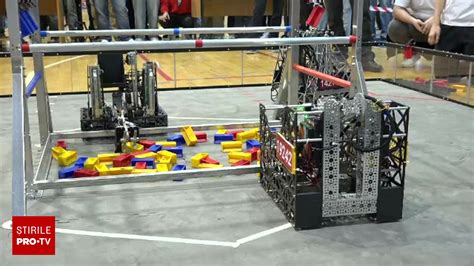 Roboți participând la competiții