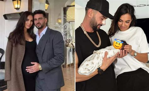 Fotografie simbolică cu un bebeluș și o mână protectoare