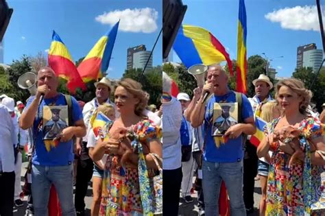 Tatăl cu nou-născutul în brațe