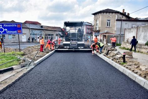 Procesul de instalare a geogrilelor pe o suprafață asfaltică