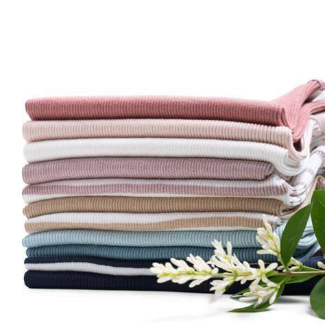 Materiale lenjerie pătuț: bumbac, bambus, lână merinos