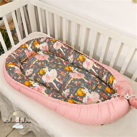 Imagine: Babynest folosit pentru momente de veghe sau masaj, în siguranță