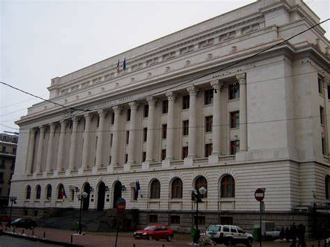 Imagine ilustrativă despre un sistem de mulgere cu brațe pentru vaci